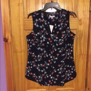 Sleeveless button down floral top with pockets
